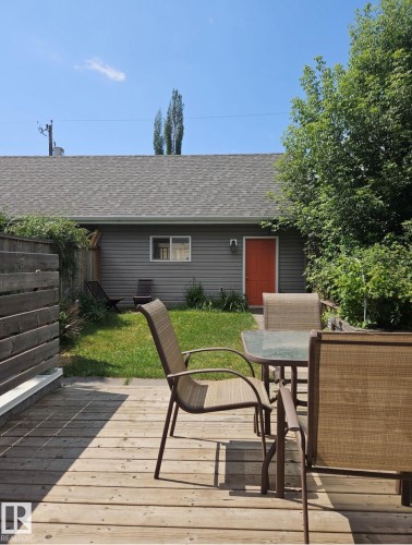 View From Deck Into The Backyard In The Summer. Double Garage. - 10216 89 Street, Edmonton, AB - Outdoor With Deck Patio Veranda With Exterior