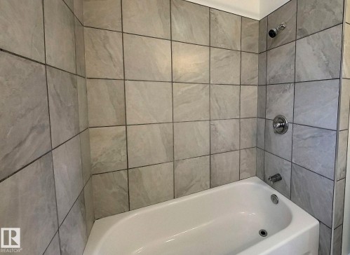 Full bathroom featuring  shower combination - 1102 55 Street, Edson, AB - Indoor Photo Showing Bathroom