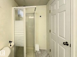 Full bath with a stall shower and toilet - 