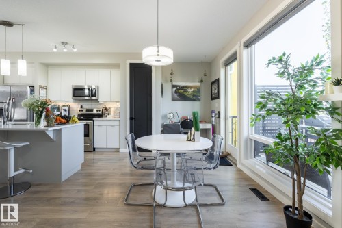 Dining room featuring light wood-style floors - 1710 Keene Crescent. Sw, Edmonton, AB - Indoor