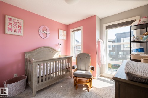 Bedroom featuring a nursery area and carpet floors - 1710 Keene Crescent. Sw, Edmonton, AB - Indoor Photo Showing Bedroom
