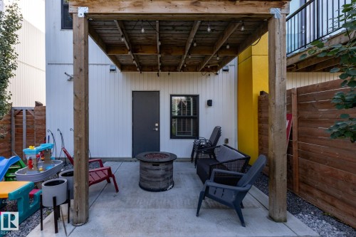 View of patio with a fire pit - 1710 Keene Crescent. Sw, Edmonton, AB - 