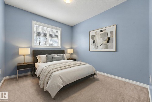 Carpeted bedroom with baseboards - 152 Rue Marquet, Beaumont, AB - Indoor Photo Showing Bedroom