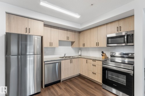 302 9504 182 Street, Edmonton, AB - Indoor Photo Showing Kitchen With Double Sink