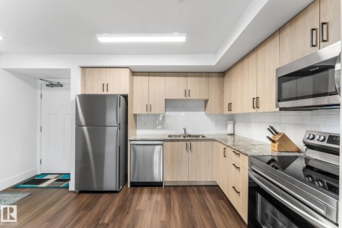 302 9504 182 Street, Edmonton, AB - Indoor Photo Showing Kitchen With Double Sink