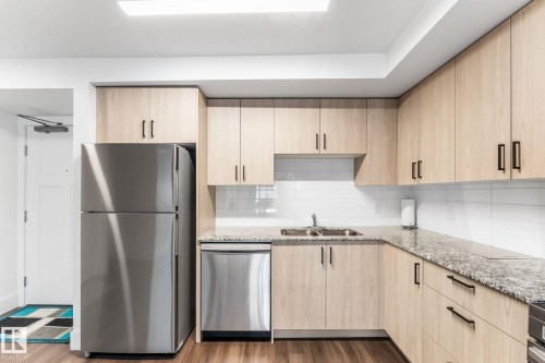 302 9504 182 Street, Edmonton, AB - Indoor Photo Showing Kitchen With Double Sink With Upgraded Kitchen
