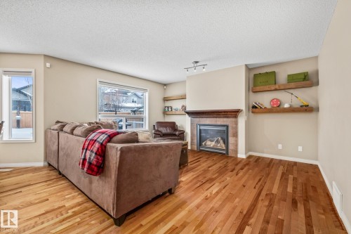 33 Newgate Way, St. Albert, AB - Indoor Photo Showing Living Room With Fireplace