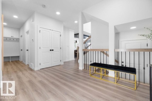 Hallway featuring light wood finished floors and recessed lighting - 3722 41 Avenue, Beaumont, AB - Indoor Photo Showing Other Room