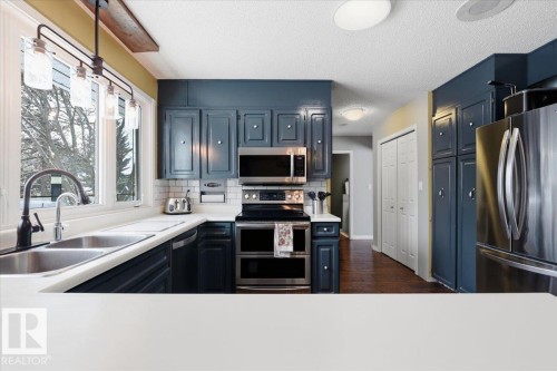 189 Elm Crescent, Wetaskiwin, AB - Indoor Photo Showing Kitchen With Double Sink