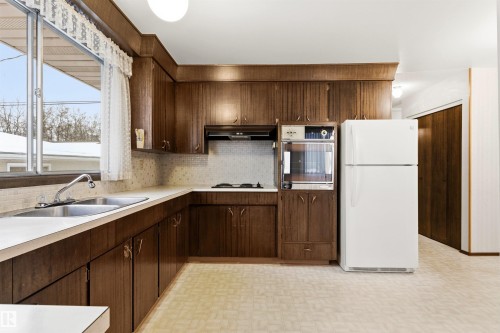 11323 35A Avenue, Edmonton, AB - Indoor Photo Showing Kitchen With Double Sink