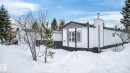 View of snowy exterior featuring a chimney - 72 Evergreen Park, Edmonton, AB  - Outdoor 