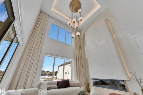 Living room with a high ceiling - 2408 1 Ave Sw, Edmonton, AB - Indoor