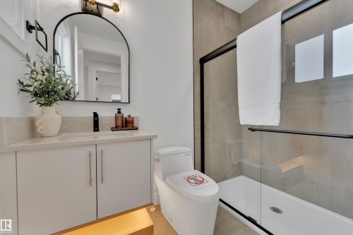 Bathroom featuring vanity and a shower stall - 2408 1 Ave Sw, Edmonton, AB - Indoor Photo Showing Bathroom