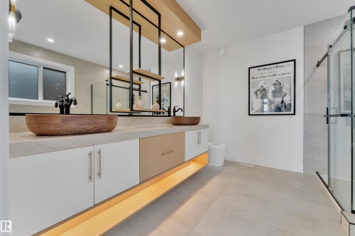Bathroom with vanity, a shower stall, concrete floors, and recessed lighting - 2408 1 Ave Sw, Edmonton, AB - Indoor Photo Showing Other Room