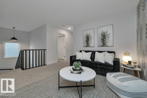 104 Bluff Cove, Leduc, AB - Indoor Photo Showing Living Room
