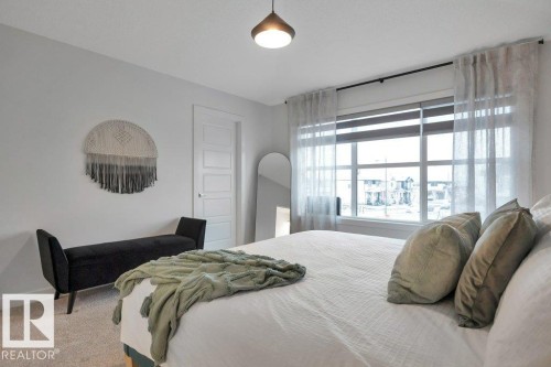 104 Bluff Cove, Leduc, AB - Indoor Photo Showing Bedroom