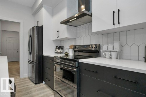 104 Bluff Cove, Leduc, AB - Indoor Photo Showing Kitchen