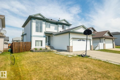 View of front facade with an attached garage and driveway - 6734 162A Avenue, Edmonton, AB - Outdoor