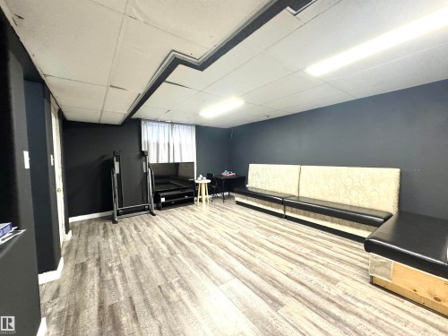 Misc room featuring a paneled ceiling - 6734 162A Avenue, Edmonton, AB - Indoor Photo Showing Other Room