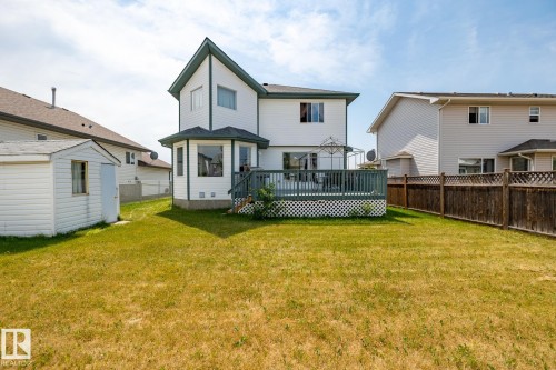 Rear view of house featuring a deck, a fenced backyard, and a shed - 6734 162A Avenue, Edmonton, AB - Outdoor With Deck Patio Veranda With Exterior