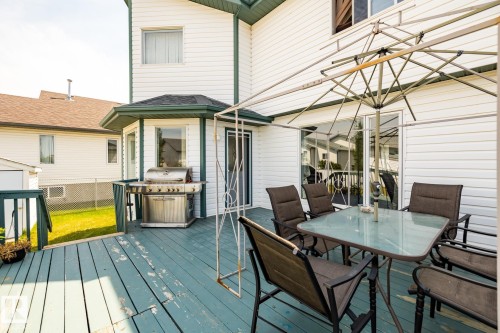 Deck with a grill and outdoor dining area - 6734 162A Avenue, Edmonton, AB - Outdoor With Deck Patio Veranda With Exterior