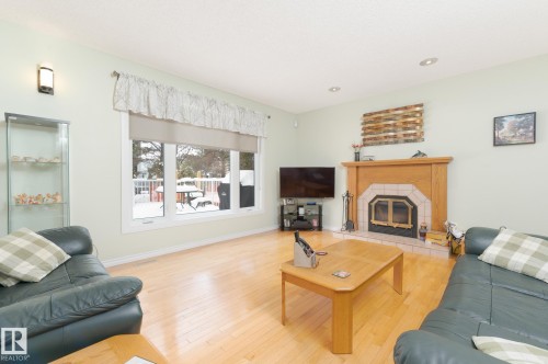 613 Whiston Wynd, Edmonton, AB - Indoor Photo Showing Living Room With Fireplace