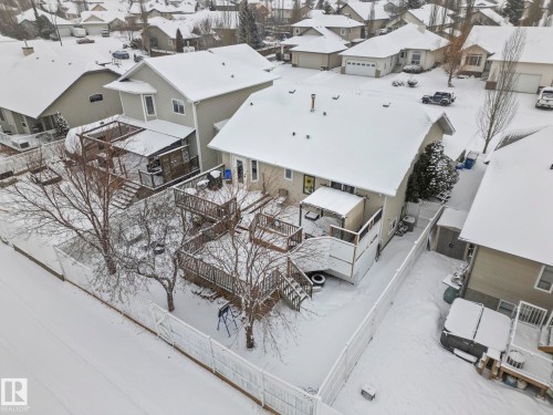 Snowy aerial view featuring a residential view - 103 Adams Close, Red Deer, AB - Outdoor