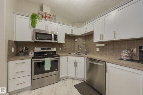 2412 9357 Simpson Drive, Edmonton, AB - Indoor Photo Showing Kitchen With Double Sink