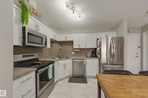 2412 9357 Simpson Drive, Edmonton, AB - Indoor Photo Showing Kitchen With Double Sink