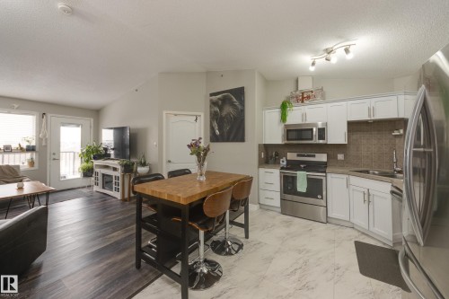 2412 9357 Simpson Drive, Edmonton, AB - Indoor Photo Showing Kitchen With Double Sink