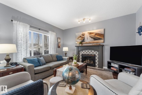 61 Wedgewood Crescent, Fort Saskatchewan, AB - Indoor Photo Showing Living Room With Fireplace