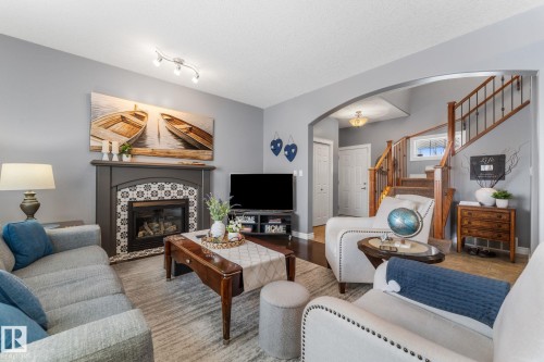 61 Wedgewood Crescent, Fort Saskatchewan, AB - Indoor Photo Showing Living Room With Fireplace