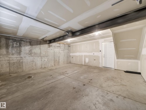 View of garage - 125 655 Tamarack Road, Edmonton, AB - Indoor Photo Showing Garage
