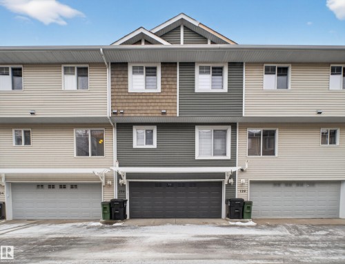 Back of property with a garage - 125 655 Tamarack Road, Edmonton, AB - Outdoor With Facade