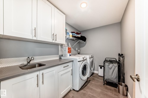 154 Aston Bend, Leduc, AB - Indoor Photo Showing Laundry Room