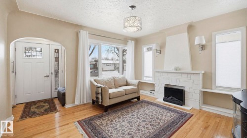12338 91 Street, Edmonton, AB - Indoor Photo Showing Living Room With Fireplace