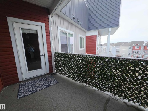 Doorway to property - 437 1818 Rutherford Road, Edmonton, AB - Outdoor With Exterior