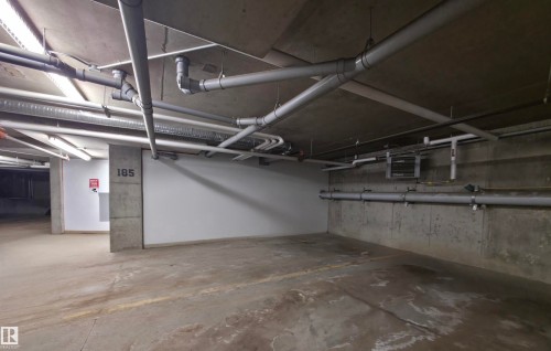 Basement with a heating unit - 437 1818 Rutherford Road, Edmonton, AB - Indoor Photo Showing Garage