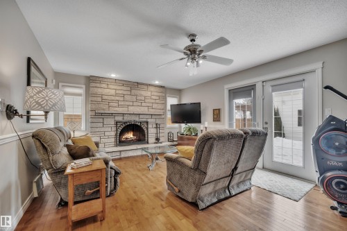 10522 30 Avenue, Edmonton, AB - Indoor Photo Showing Living Room With Fireplace