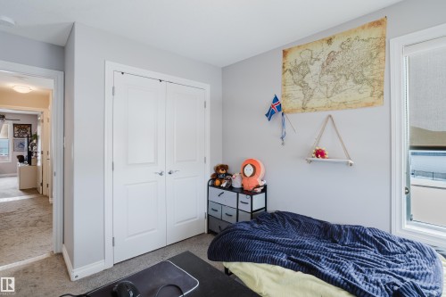 Bedroom with a closet and baseboards - 326 West Haven Drive, Leduc, AB - Indoor Photo Showing Bedroom