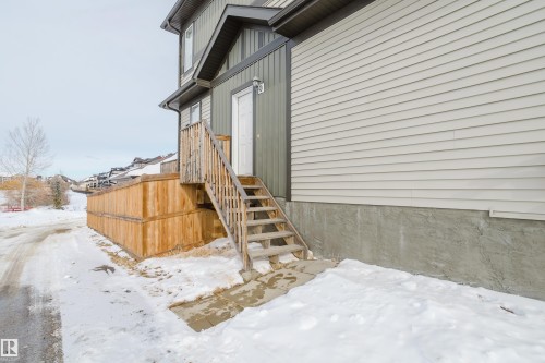View of snow covered property entrance - 326 West Haven Drive, Leduc, AB - Outdoor With Exterior