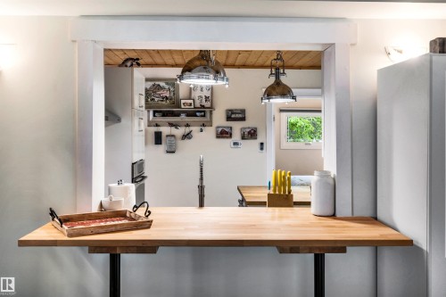 Dining space with wood ceiling - 605 6St. Ross Haven, Rural Lac Ste. Anne County, AB - Indoor