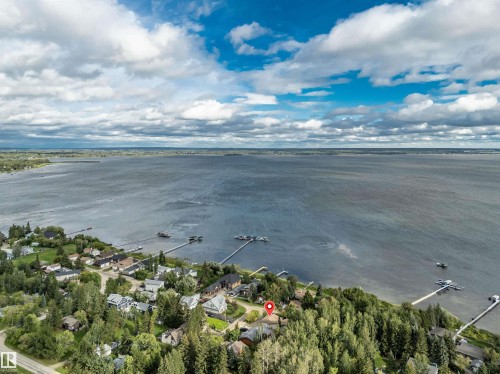 View of property location with a nearby body of water - 605 6St. Ross Haven, Rural Lac Ste. Anne County, AB - Outdoor With Body Of Water With View