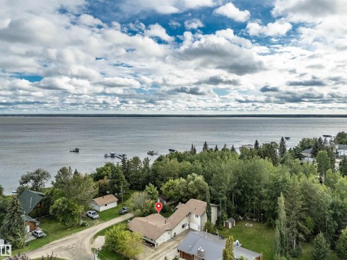 Aerial view of property's location with a large body of water - 605 6St. Ross Haven, Rural Lac Ste. Anne County, AB - Outdoor With Body Of Water With View