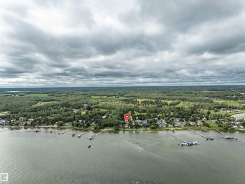Drone / aerial view of a forest - 605 6St. Ross Haven, Rural Lac Ste. Anne County, AB - Outdoor With Body Of Water With View
