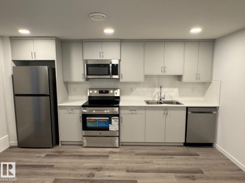 3965 Wren Loop, Edmonton, AB - Indoor Photo Showing Kitchen With Double Sink
