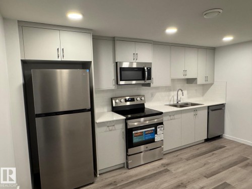 3965 Wren Loop, Edmonton, AB - Indoor Photo Showing Kitchen With Double Sink