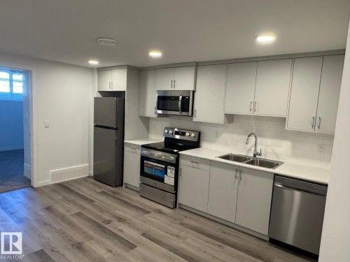 3965 Wren Loop, Edmonton, AB - Indoor Photo Showing Kitchen With Double Sink