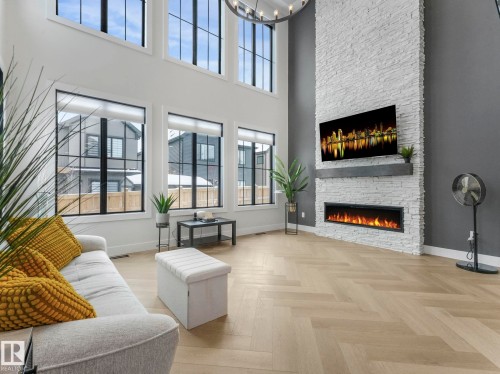 41 Cannes Cove, St. Albert, AB - Indoor Photo Showing Living Room With Fireplace