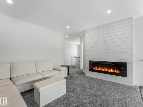 41 Cannes Cove, St. Albert, AB - Indoor Photo Showing Living Room With Fireplace